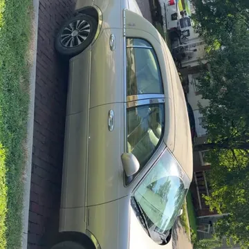 1999 Lincoln Town Car Cartier L Sedan 4D