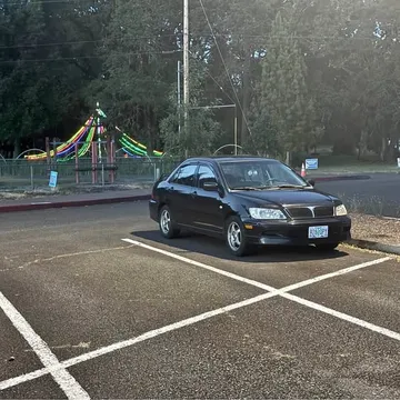 2003 Mitsubishi Lancer OZ Rally Sedan 4D