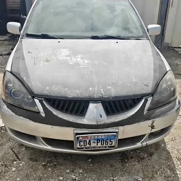 2004 Mitsubishi Lancer OZ Rally Sedan 4D