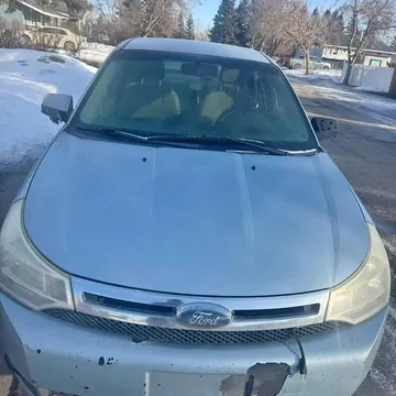 2008 Ford Focus. Milage- 395,000.