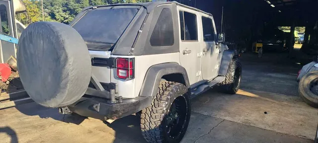 2009 Jeep Wrangler Unlimited Black & Tan Sport Utility 4D