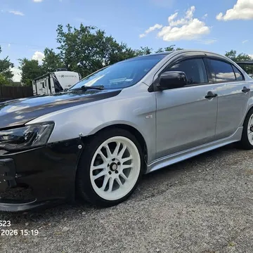 2009 Mitsubishi Lancer · ES Sedan 4D