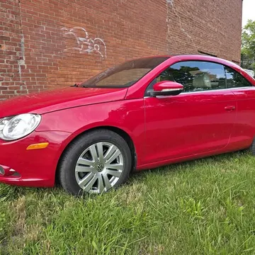2010 Volkswagen Eos Turbo Hard Top Convertible 2D