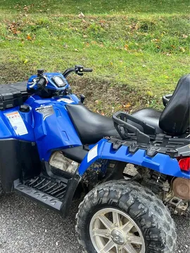 2012 Polaris 850 4 x 4, power steering 1500 miles with a winch , extra seat, ￼two cupholders ￼