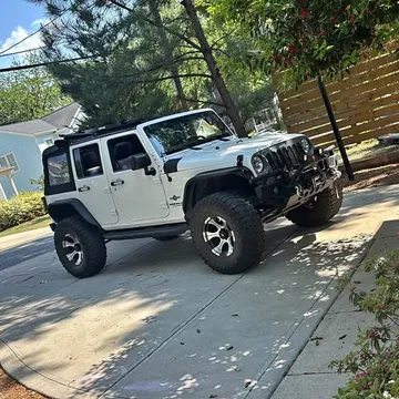 2013 Jeep Wrangler Unlimited · Oscar Mike