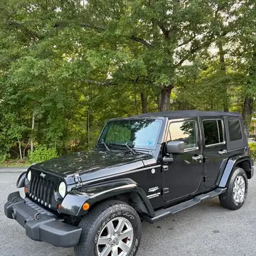 2013 Jeep Wrangler Unlimited Sahara Sport Utility 4D