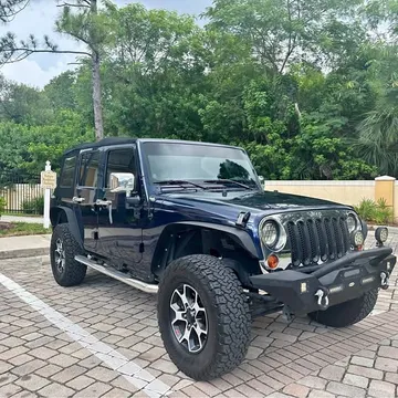 2013 Jeep Wrangler Unlimited · Sport SUV 4D