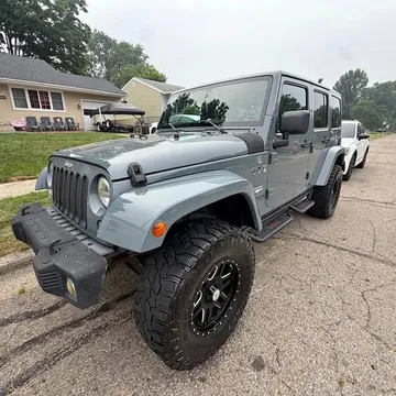 2014 Jeep Wrangler Unlimited Sahara Sport Utility 4D