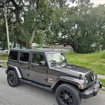 2014 Jeep Wrangler Unlimited Sahara Sport Utility 4D