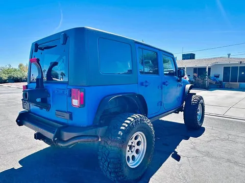 2016 Jeep Wrangler Unlimited Black & Tan Sport Utility 4D